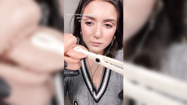 A girl is reading a magazine in the bathroom, showcasing seductive poses