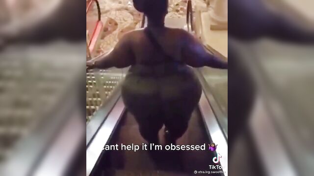 Two girls are having fun while making a social media post