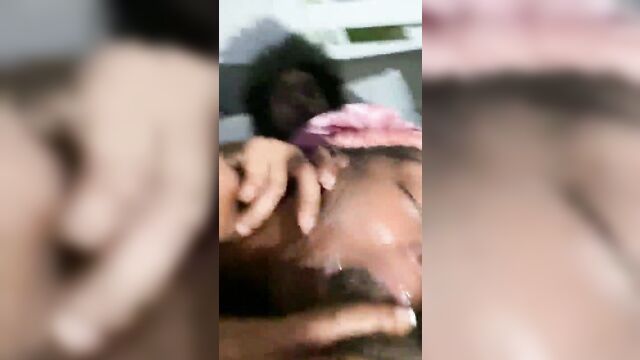 An ebony thot gives a deep blowjob while her man is at work