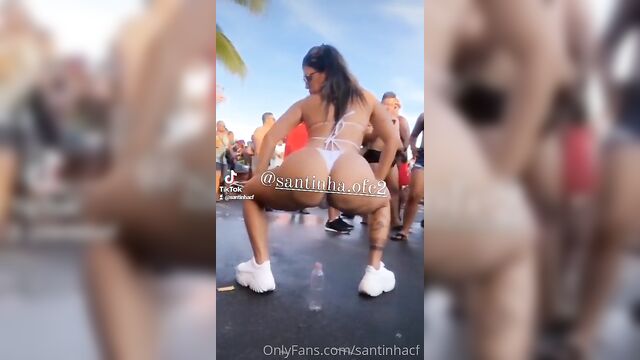 The brazilian girl is preparing for the carnival, she wants to look great