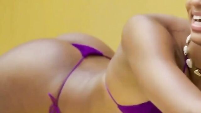 Angel reese shows her body in a pink bikini during wnba play