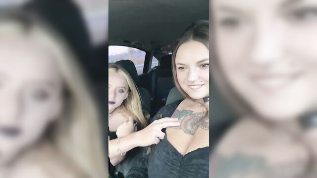 Busty tattooed tits & cleavage tease in car with affectionate emojis