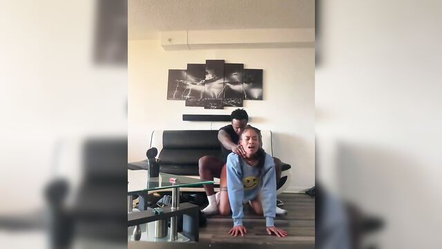 An ebony girl is having fun with a big black guy’s cock