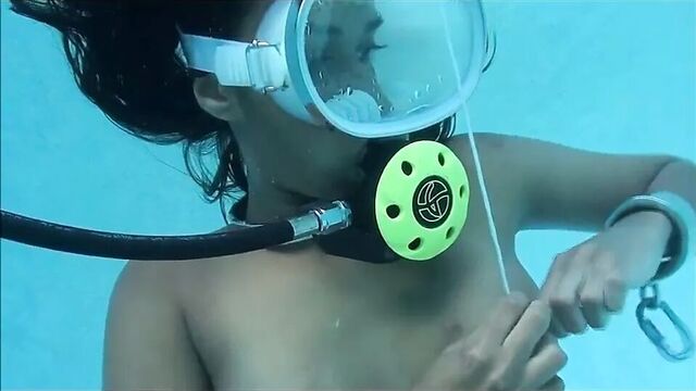 Scuba self-bondage